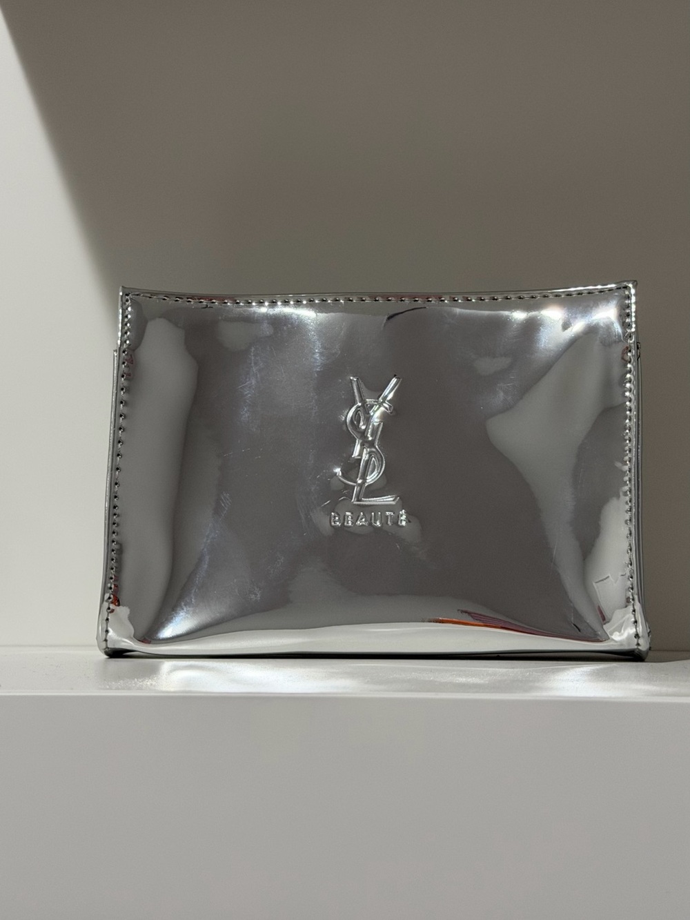 Yves Saint Laurent Beauté metallic silver makeup bag cosmetic pouch GWP
